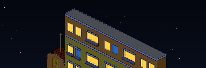 Die Front des Bahhos bei Nacht, die Fenster leuchten